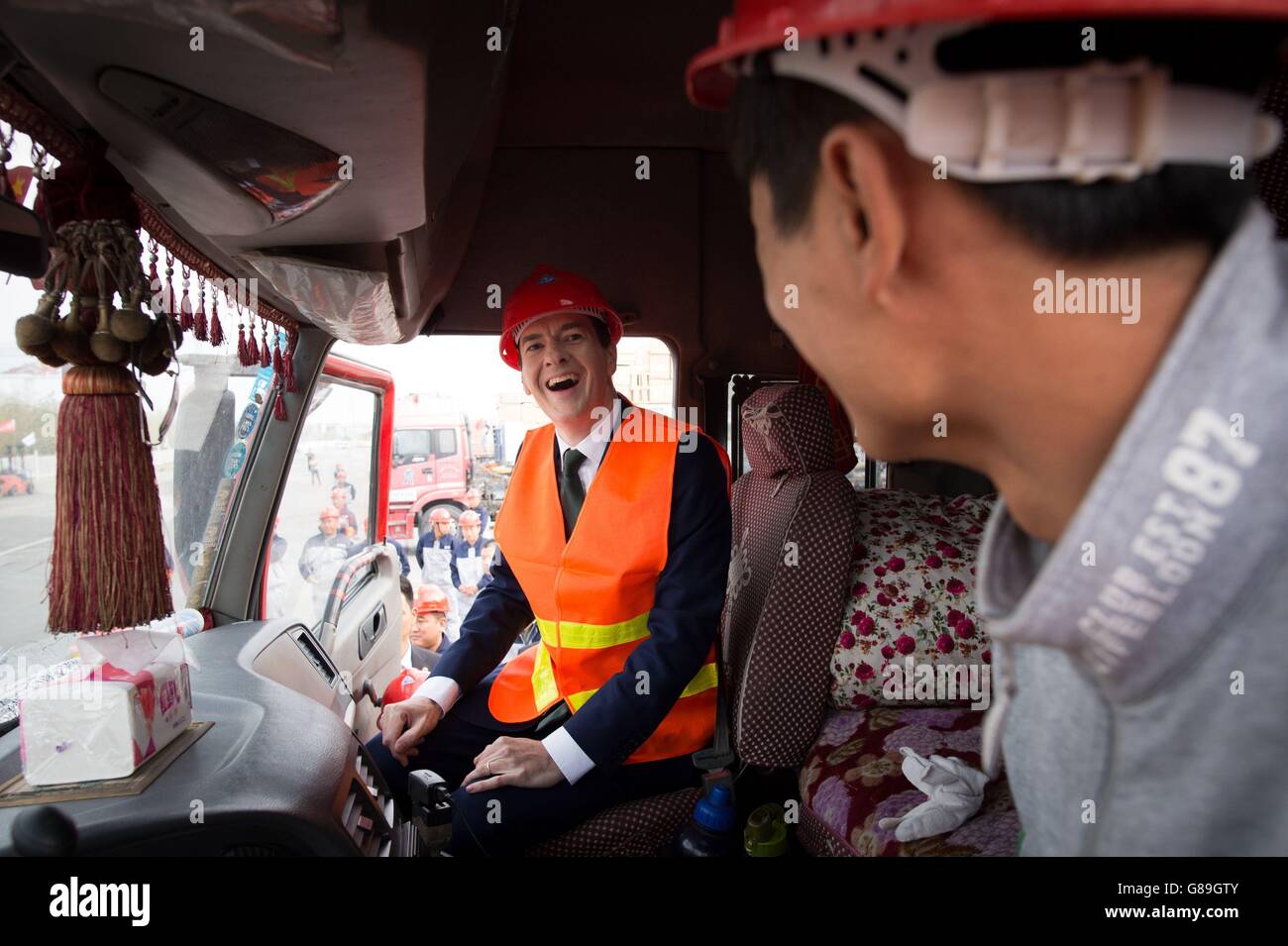 Chancellor of the Exchequer George Osborne visits an industrial area in the city of Urumqi in north west China, after he became the first serving government minister to travel to Xinjiang province. Stock Photo