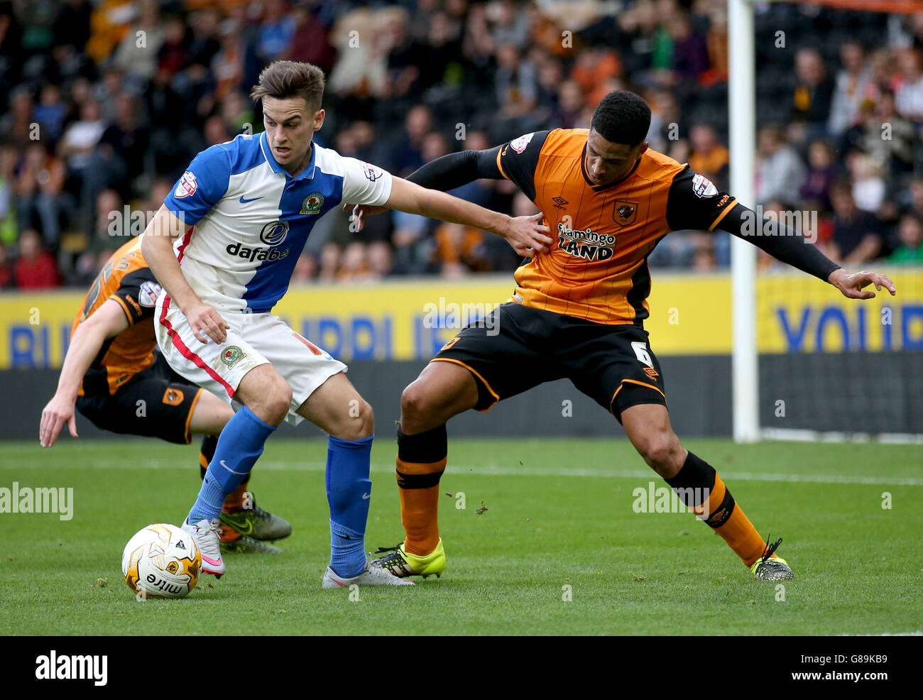 Hull City's Curtis Davies (right) and Blackburn Rovers' Tom Lawrence battle for the ball Stock Photo
