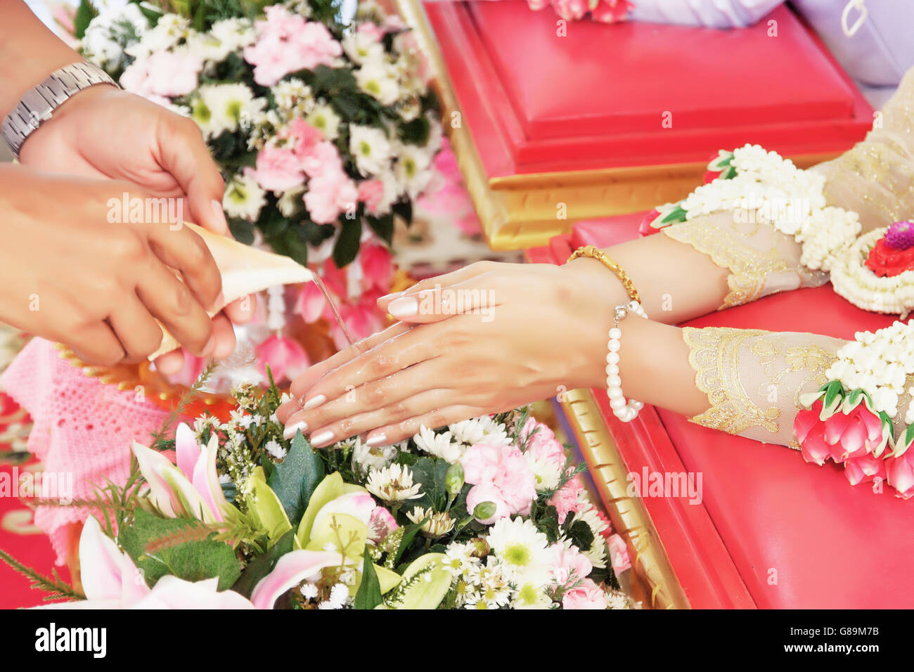 Watering Trumpet Wedding in Traditions Thailand. Stock Photo