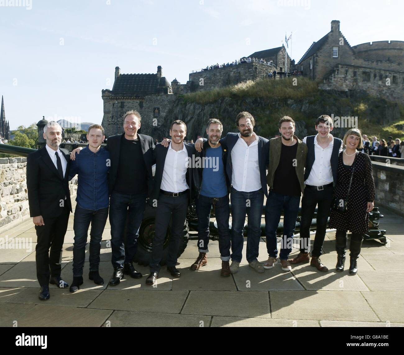 Macbeth stars (left to right) Iain Canning, Ross Anderson, David Thewlis, Michael Fassbender, Paddy Considine, Director Justin Kurzel, Jack Reynor, James Harknes and Laura Smith during a photocall at Edinburgh Castle in Scotland. Stock Photo