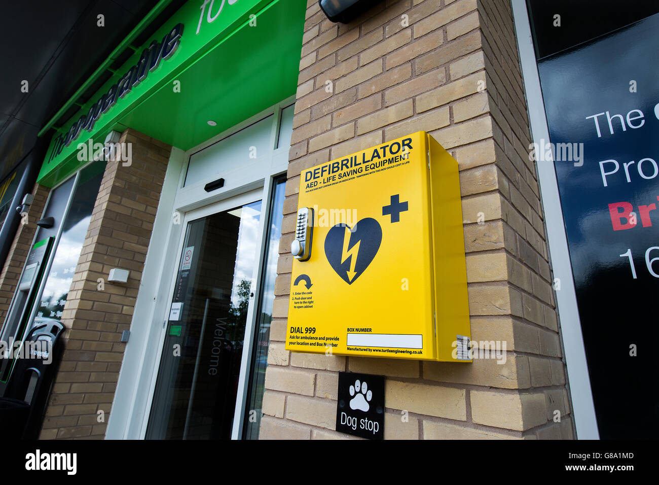 Medical Defibrillator outside a Co-operative Food Store in Nottingham, UK Stock Photo