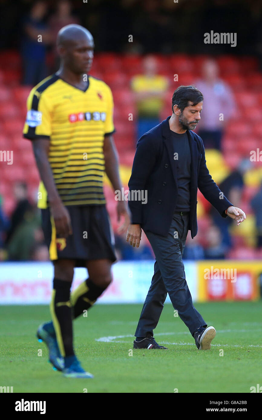 Watford manager Quique Sanchez Flores looks dejected after the final whistle during the Barclays Premier League match at Vicarage Road, London. Stock Photo