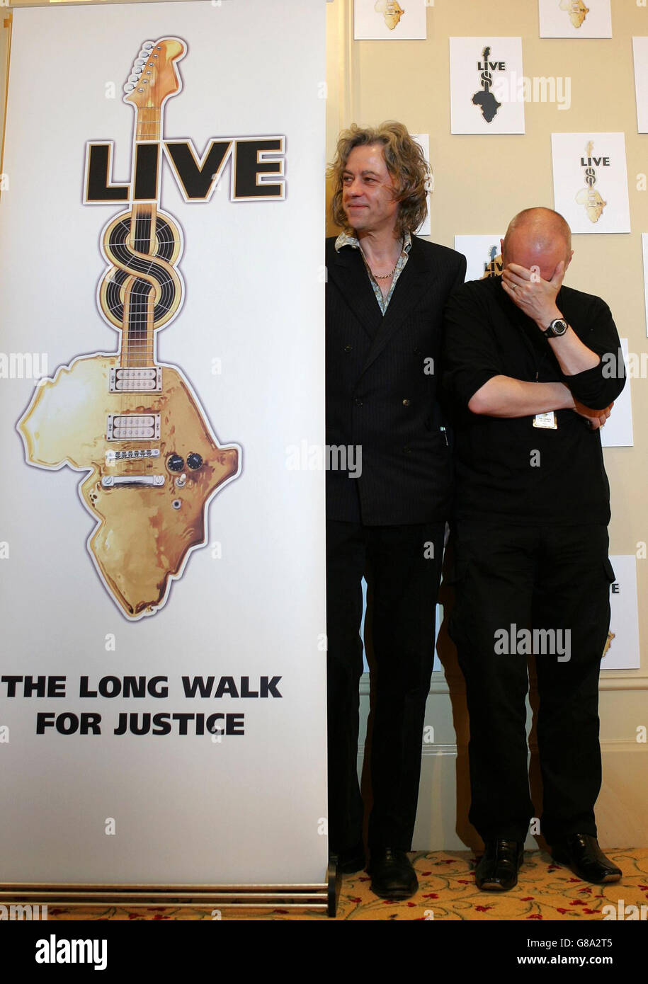 Live 8 Press Conference - Grosvenor House Hotel. Sir Bob Geldof (left) with Midge Ure. Stock Photo