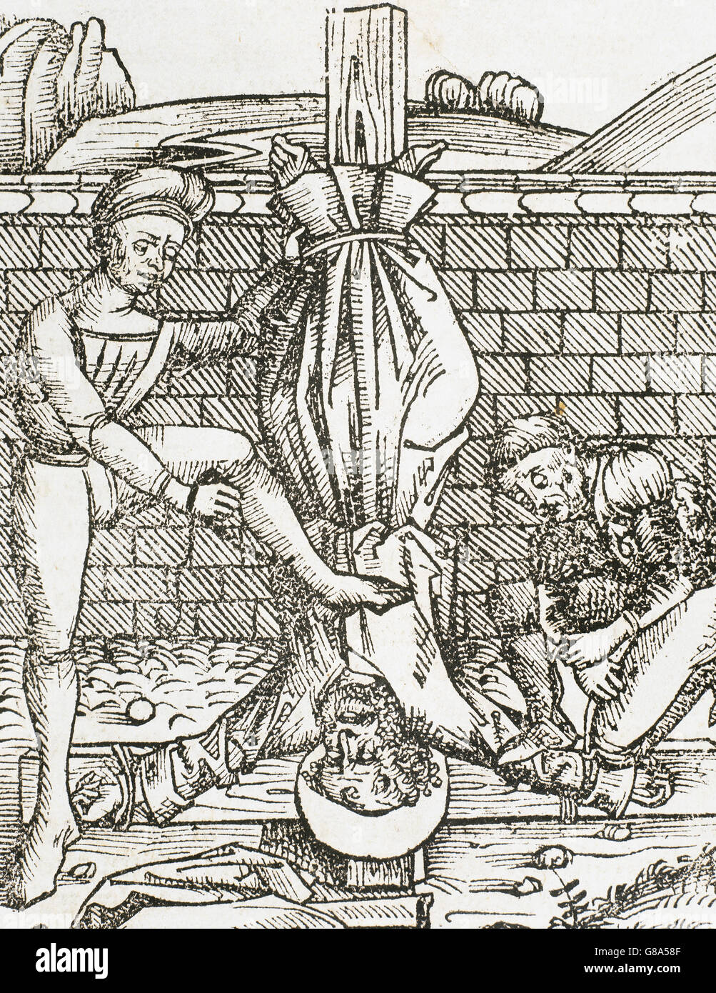 Martyrdom of Saint Peter. Engraving, 16th century. Stock Photo