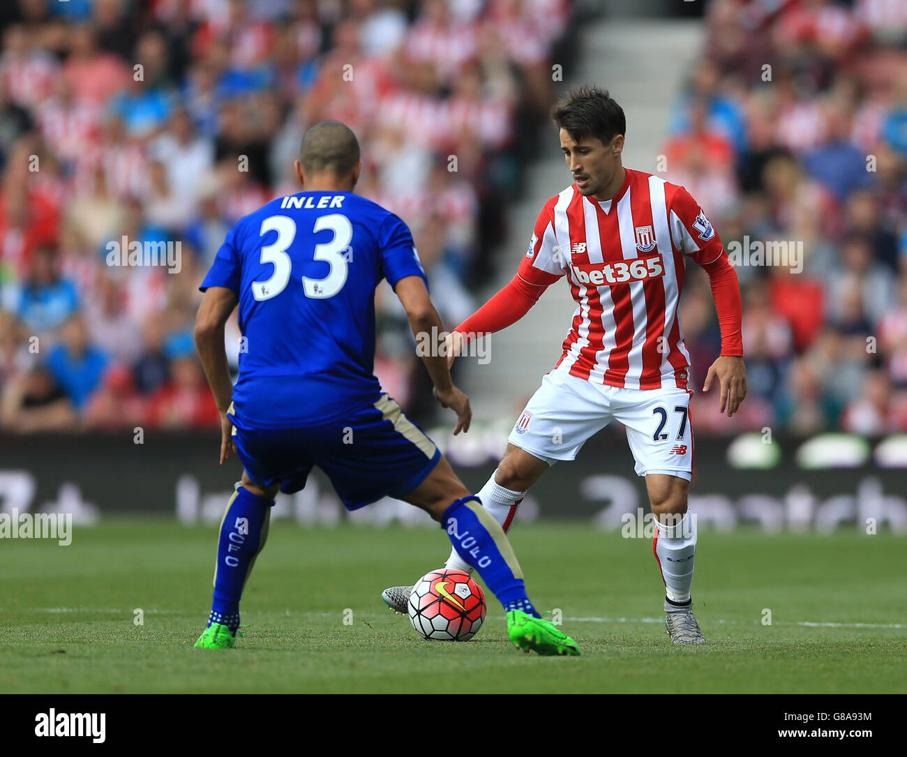 Stoke City S Bojan Krkic And Leicester City S Gokhan Inler Left Battle For The Ball During The Barclays Premier League Match At The Britannia Stadium Stoke On Trent Stock Photo Alamy