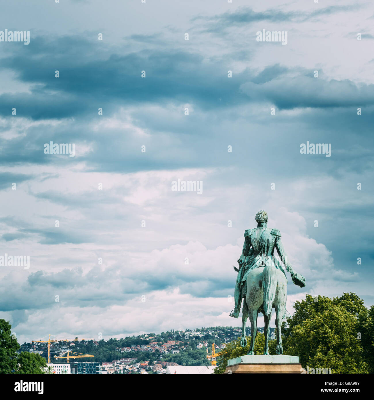 Statue of Norwegian King and main street Karl Johans Gate leading to the Royal Palace in Oslo, Norway Stock Photo