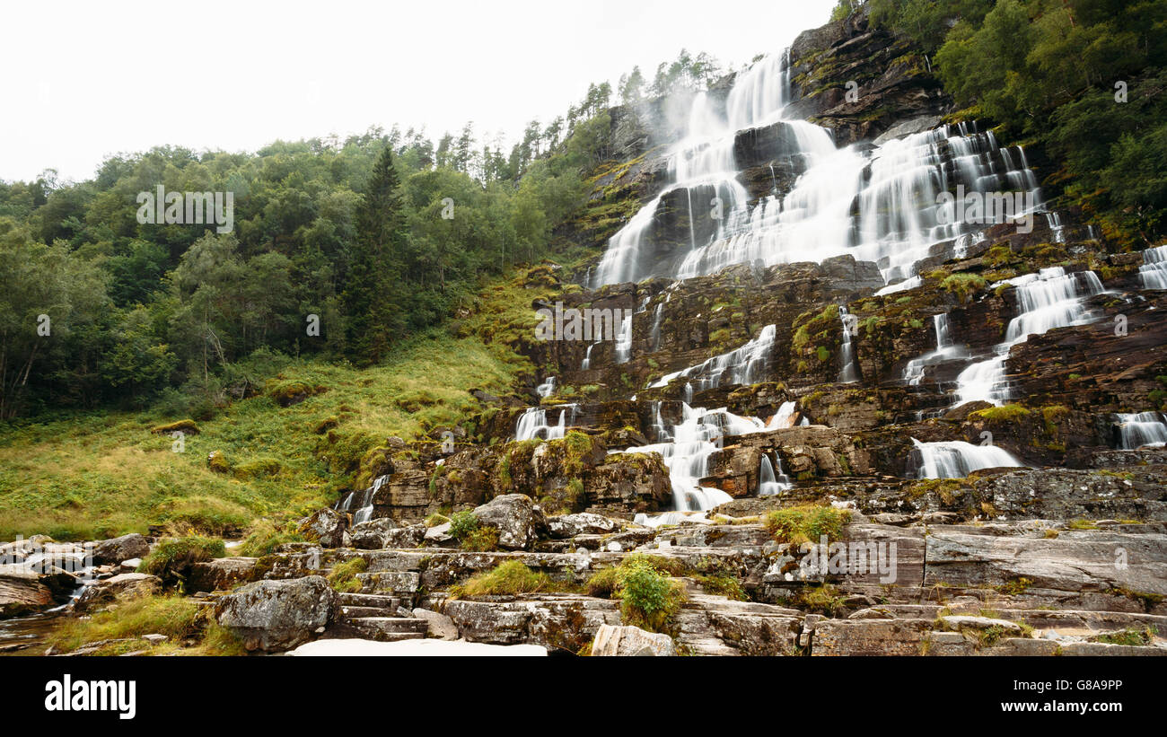 Panorama of Tvindefossen Waterfall in Norway. Norwegian nature landscape at summer. Waterfall Tvindefossen is largest and highes Stock Photo