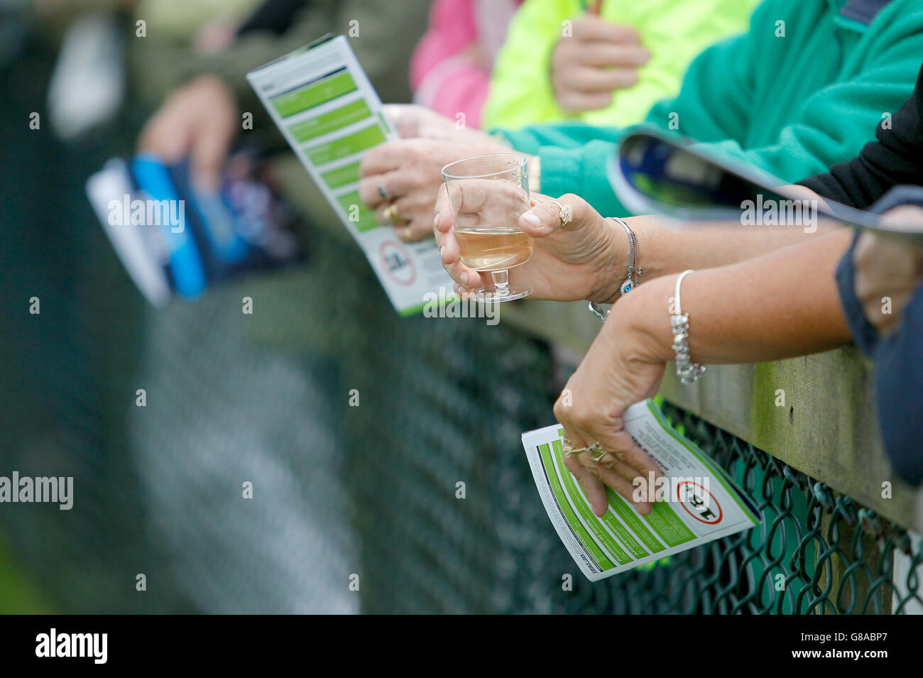 A racegoer enjoys a drink at Beverley Racecourse. PRESS ASSOCIATION Photo. Picture date: Tuesday September 22, 2015. See PA story RACING Beverley. Photo credit should read: Richard Sellers/PA Wire. Stock Photo