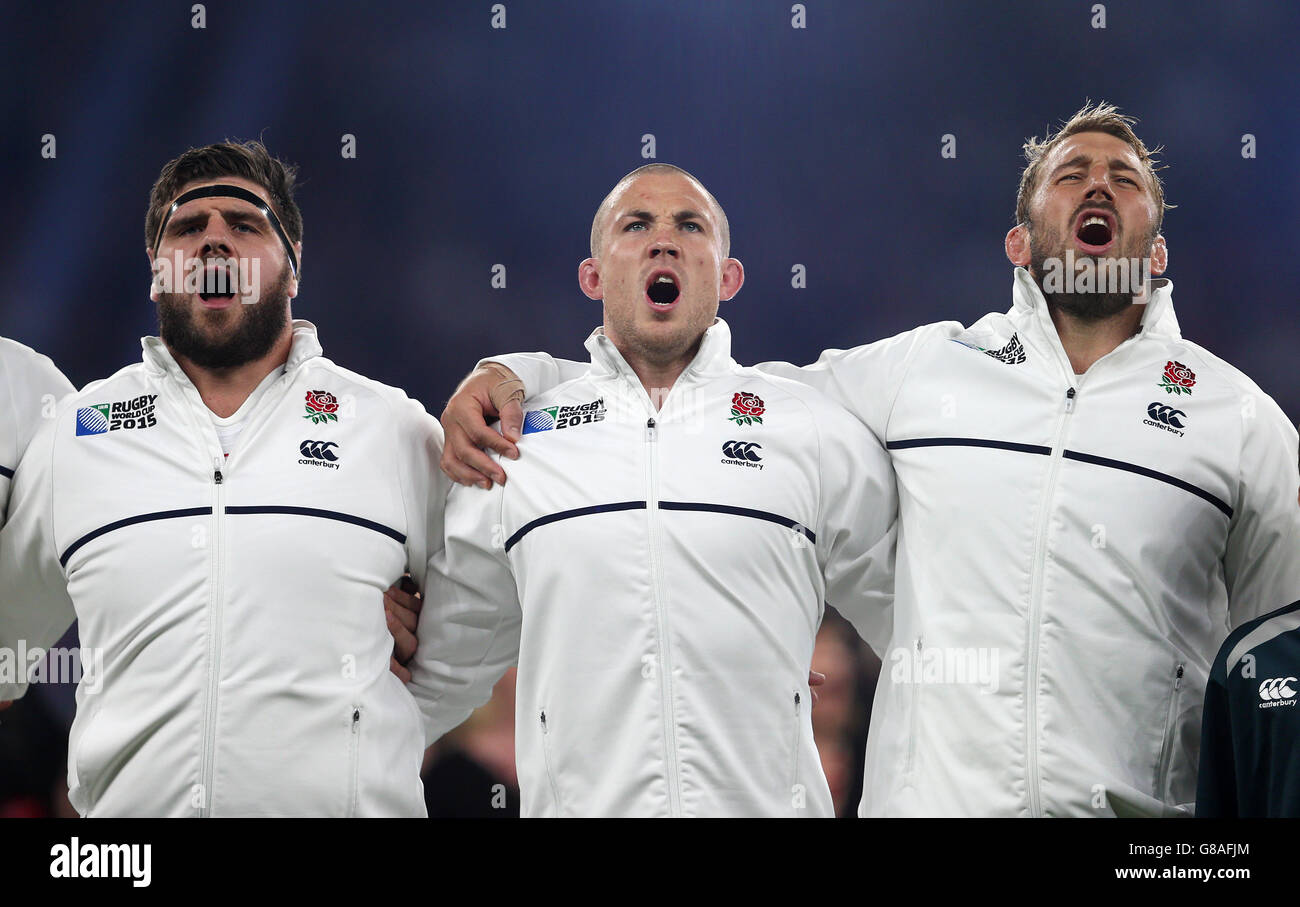 England's (l-r) Rob Webber, Mike Brown and Chris Robshaw sing the national anthem before the Rugby World Cup match at Twickenham Stadium, London. Stock Photo