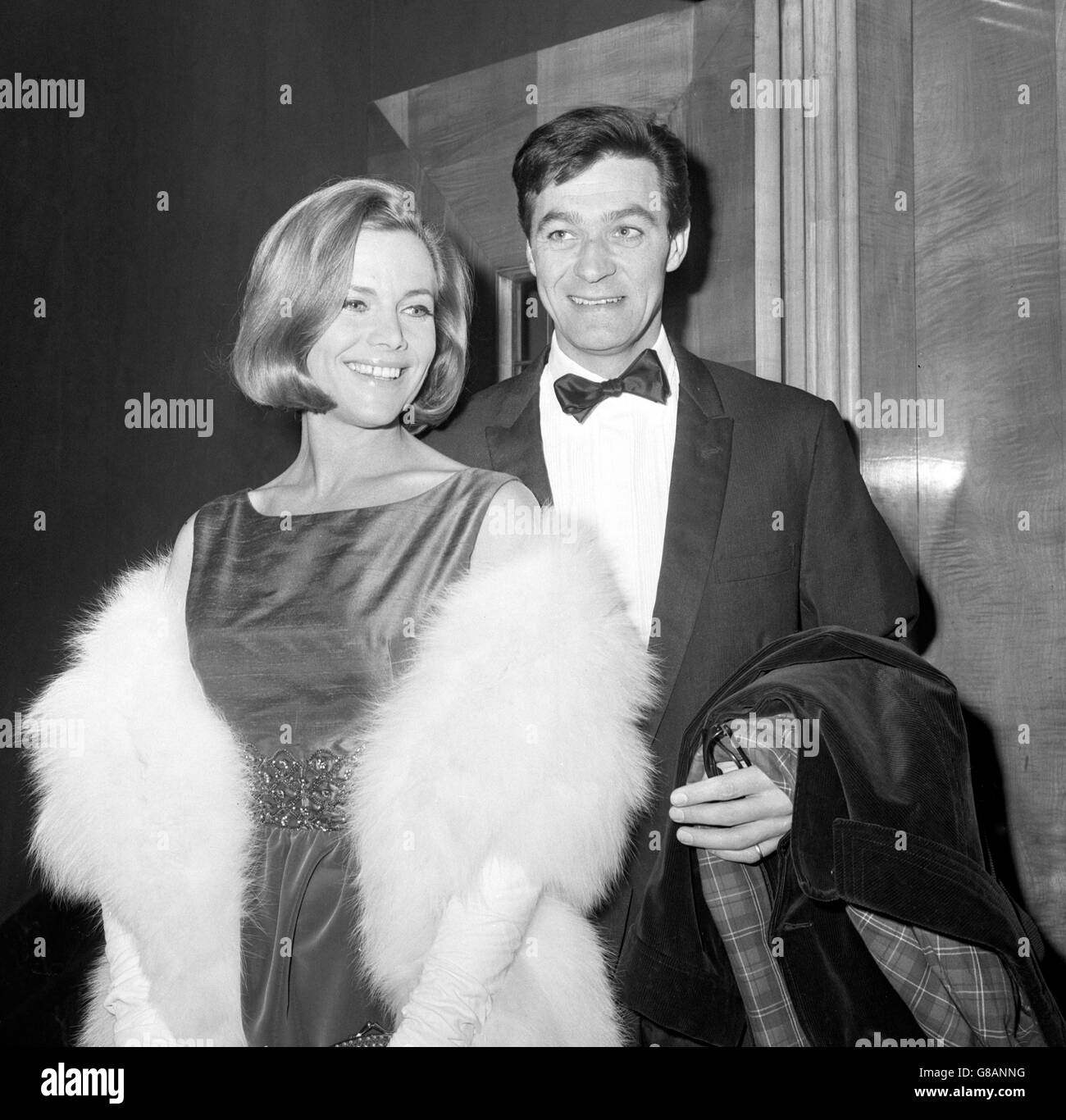 Honor Blackman and her husband Maurice Kauffman at the British opening of Life at the Top at the Odeon, Leicester Square. The new film is a continuation of Room at the Top. Stock Photo