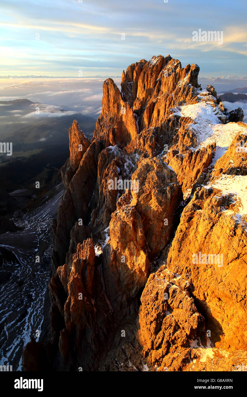 Aerial shot of Sassolungo at sunset Sella Group Val Gardena Dolomites Trentino Alto Adige Italy Europe Stock Photo