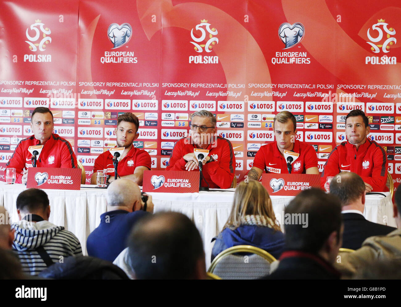 (From left to right) Polish FA Press Officer Jakub Kwiatkowski, Maciej Rybus, manager Adam Nawalka, Kamil Grosicki and Grzegorz Krychowiak during the press conference at Hampden Auditorium, Glasgow. Stock Photo