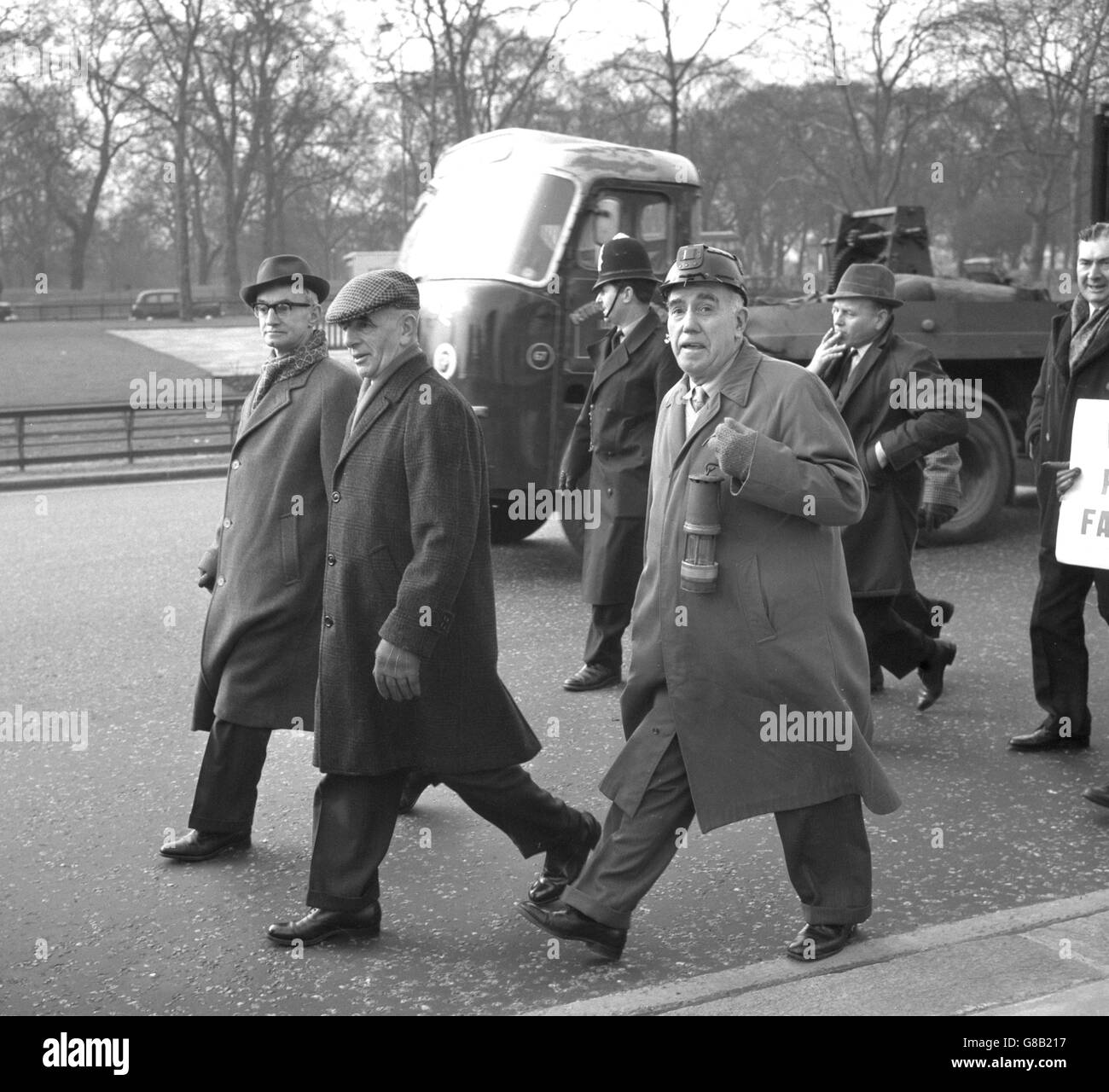 A miner's lamp and helmet are worn in a protest march through London, when miners from all over Britain proceeded from Hyde Park Corner to St James's. After the members dispersed, individuals made their way to the House of Commons to lobby MPs on proposed pit closures. Stock Photo