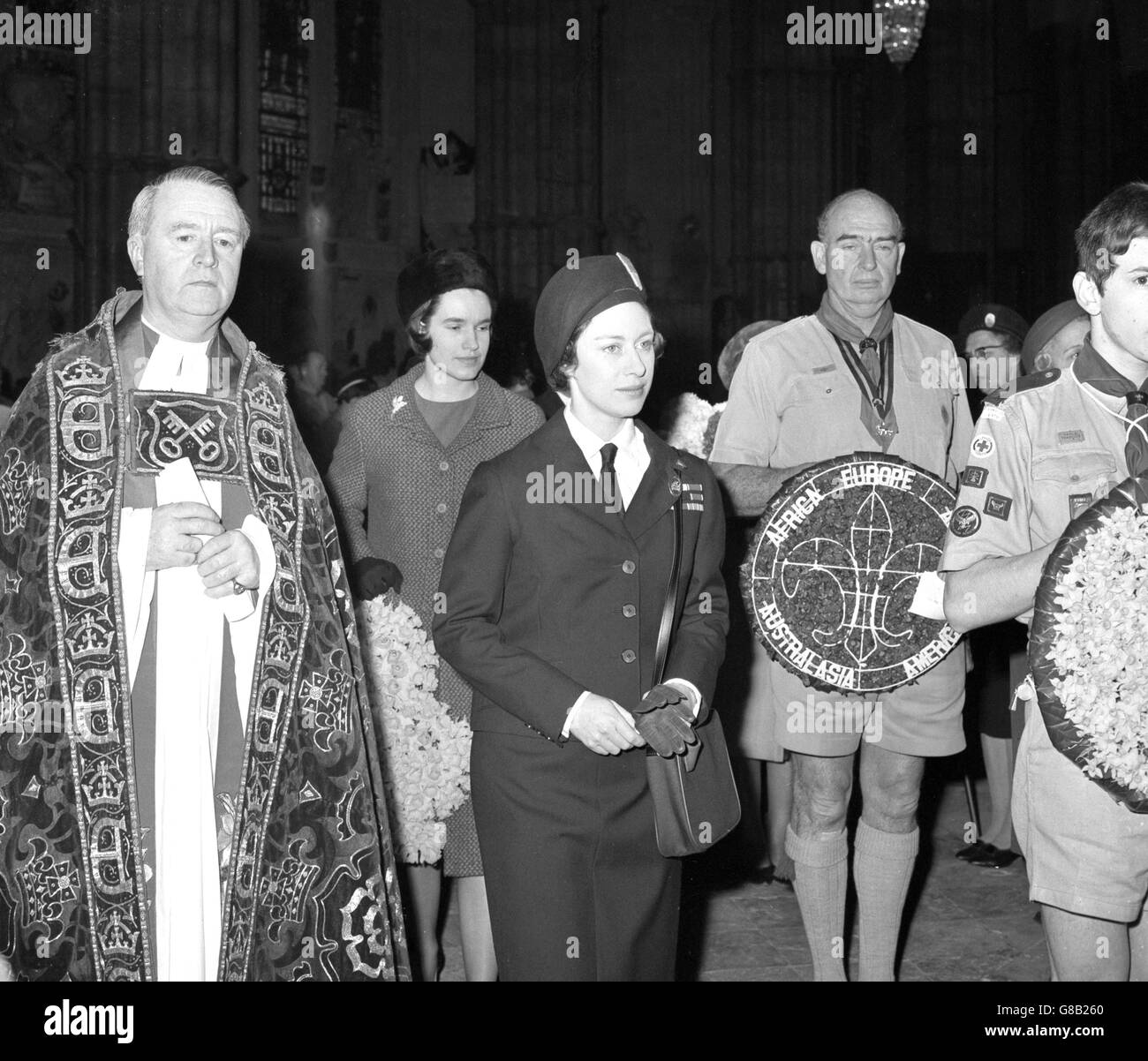 Princess Margaret, as President of the Girl Guide Association, pictured with the Dean of Westminster the Very Reverend Eric Abbott, at Westminster Abbey. Wreaths were placed on the Memorial Stone of Robert Baden-Powell, Founder of the Scout and Guide Movement, during a special service of thanksgiving and dedication, held close to the birthday of Baden-Powell (Feb 22nd). The service was also part of the Abbey's 900th anniversary celebrations. Stock Photo