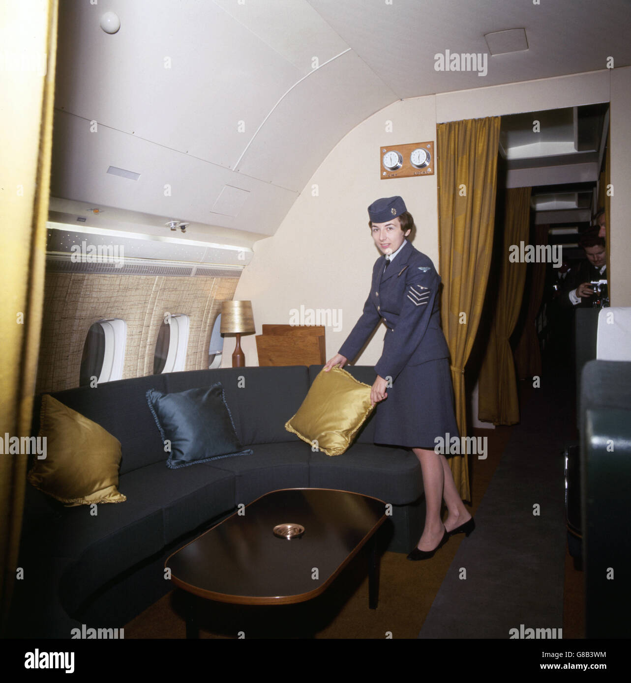 Sgt. D. Mitchell, WRAF of Pulborough, Sussex, in the lounge and dining area on the VC 10 aircraft that flew her Majesty the Queen to South America for the State visit. Sgt. Mitchell was a member of the crew. She is pictured here at Brize Norton, Oxon. Stock Photo