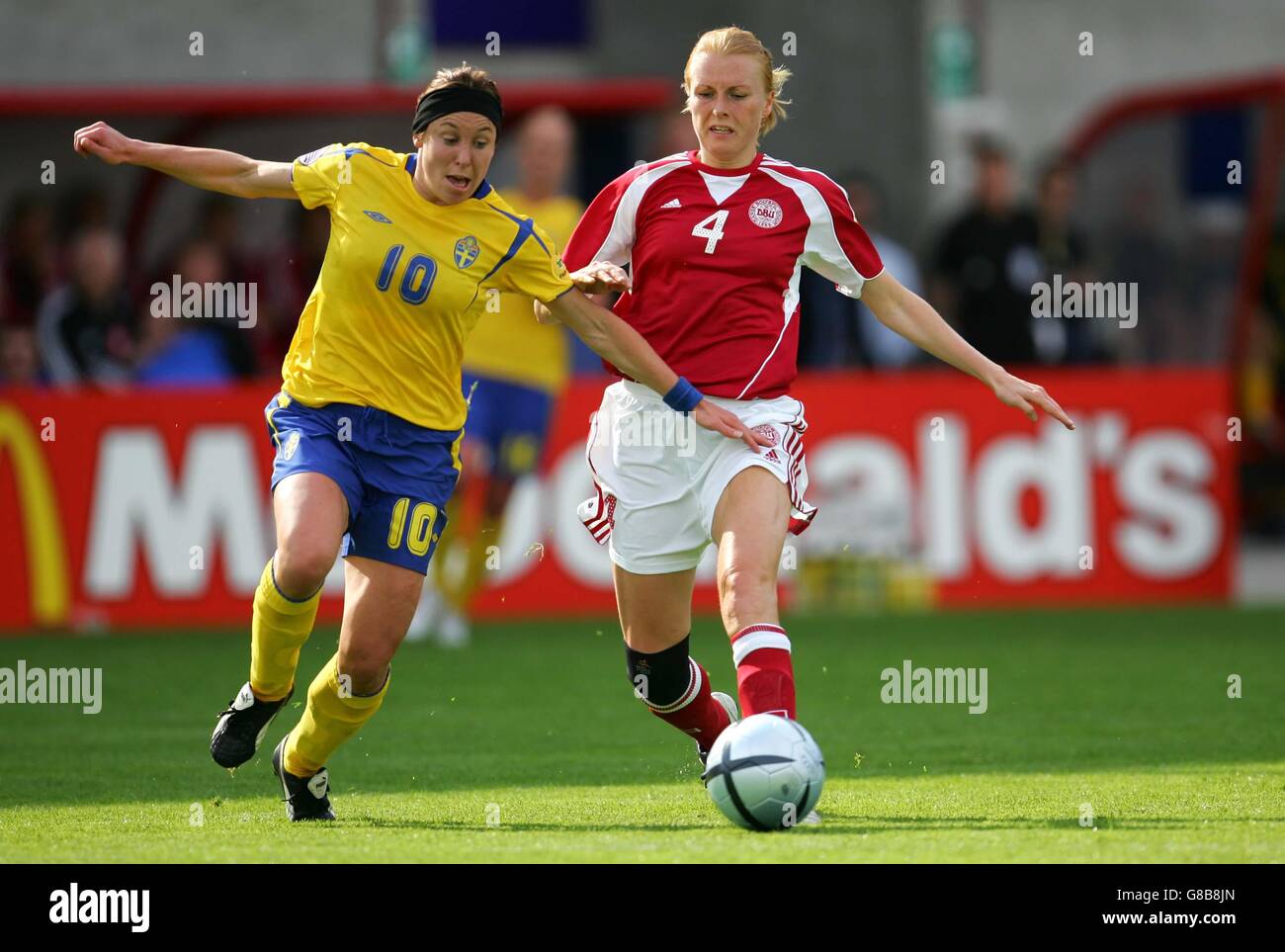 Soccer - UEFA European Women's Championship 2005 - Group A - Sweden v Denmark - Bloomfield Road. Sweden's Hanna Ljungberg and Denmark's Gitte Andersen Stock Photo