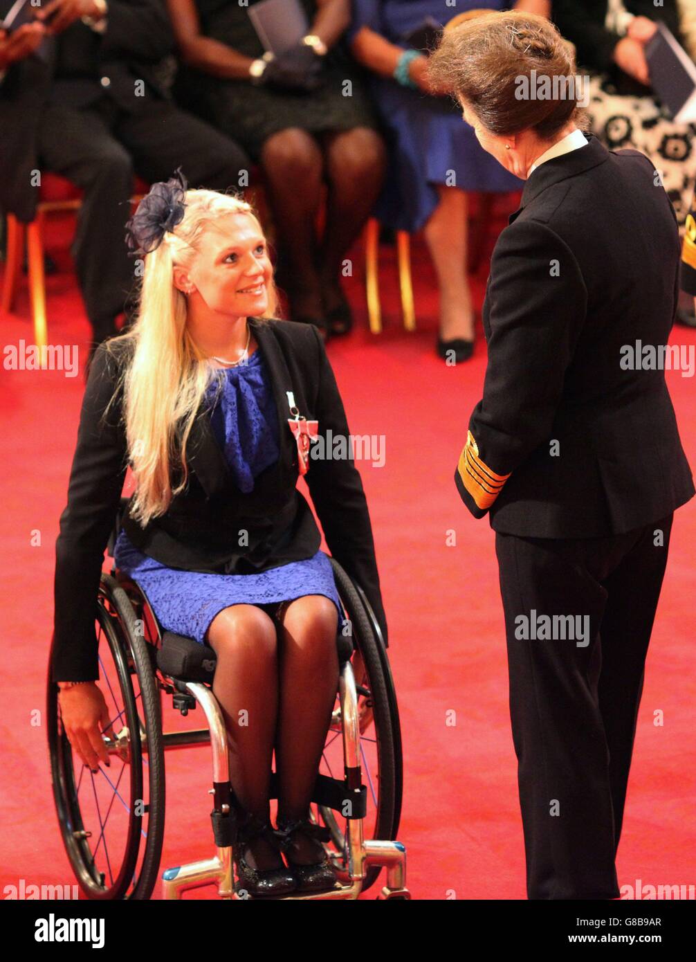 Wheelchair sportswoman Miss Jordanne Whiley from London is made an MBE (Member of the Order of the British Empire) by the Princess Royal at Buckingham Palace. Stock Photo