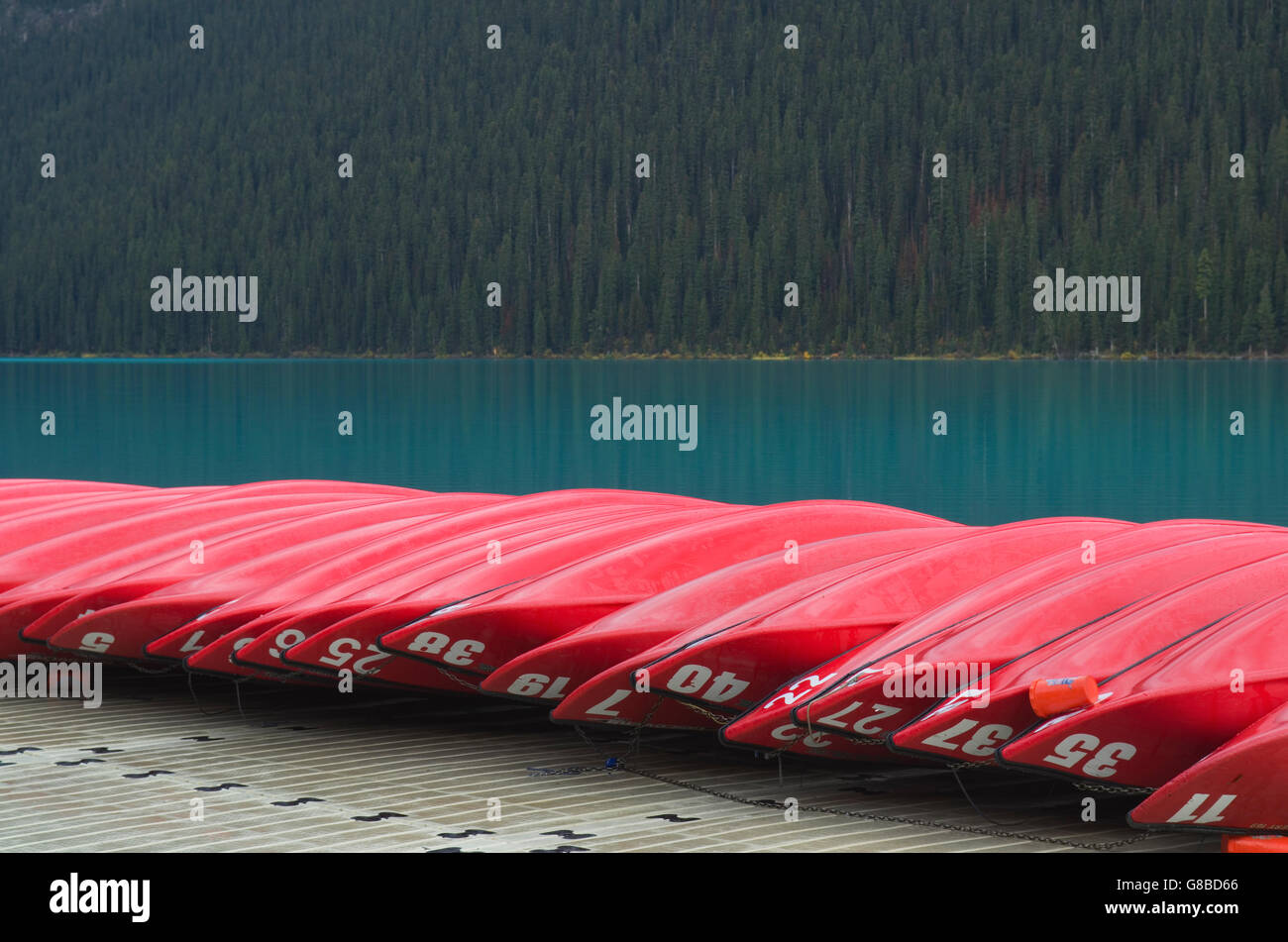 Banff Dock Red canoes on dock, Lake Louise, Banff National Park Stock Photo - Alamy