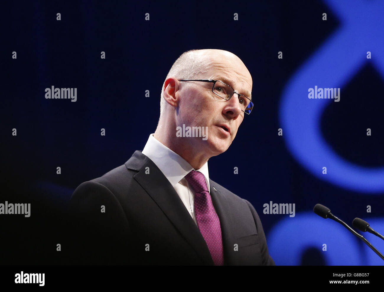 Deputy First Minister John Swinney addresses the SNP National conference at Aberdeen Exhibition and Conference Centre in Scotland. Stock Photo