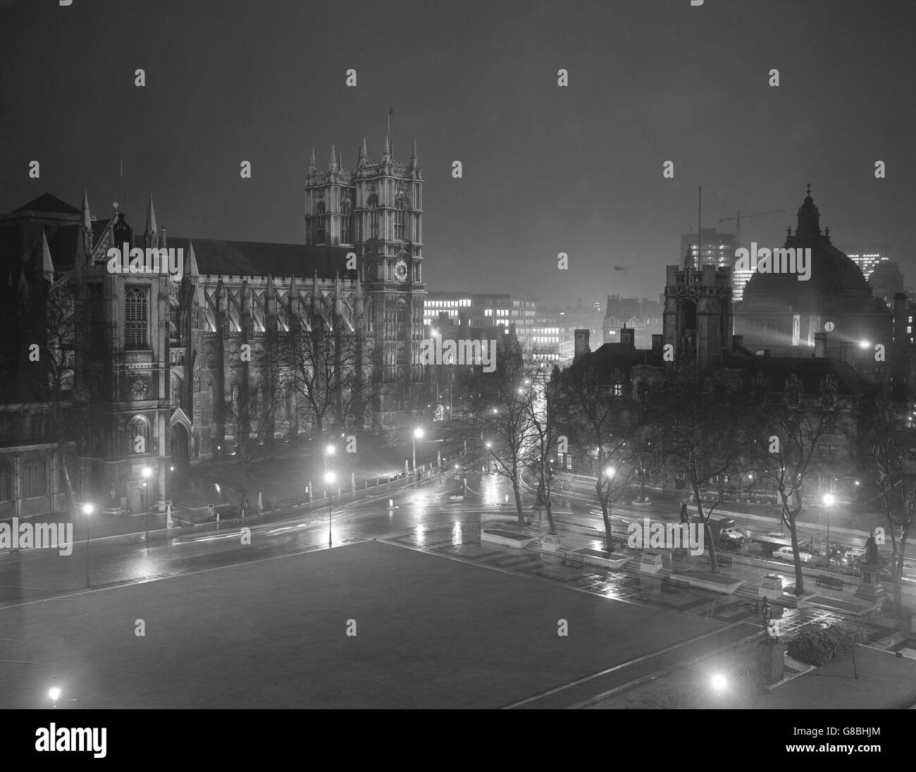 London's Parliament Square, dominated by the floodlit Westminster Abbey. The abbey, illuminated for its 900th anniversary year, is to be permanently floodlighted. Stock Photo