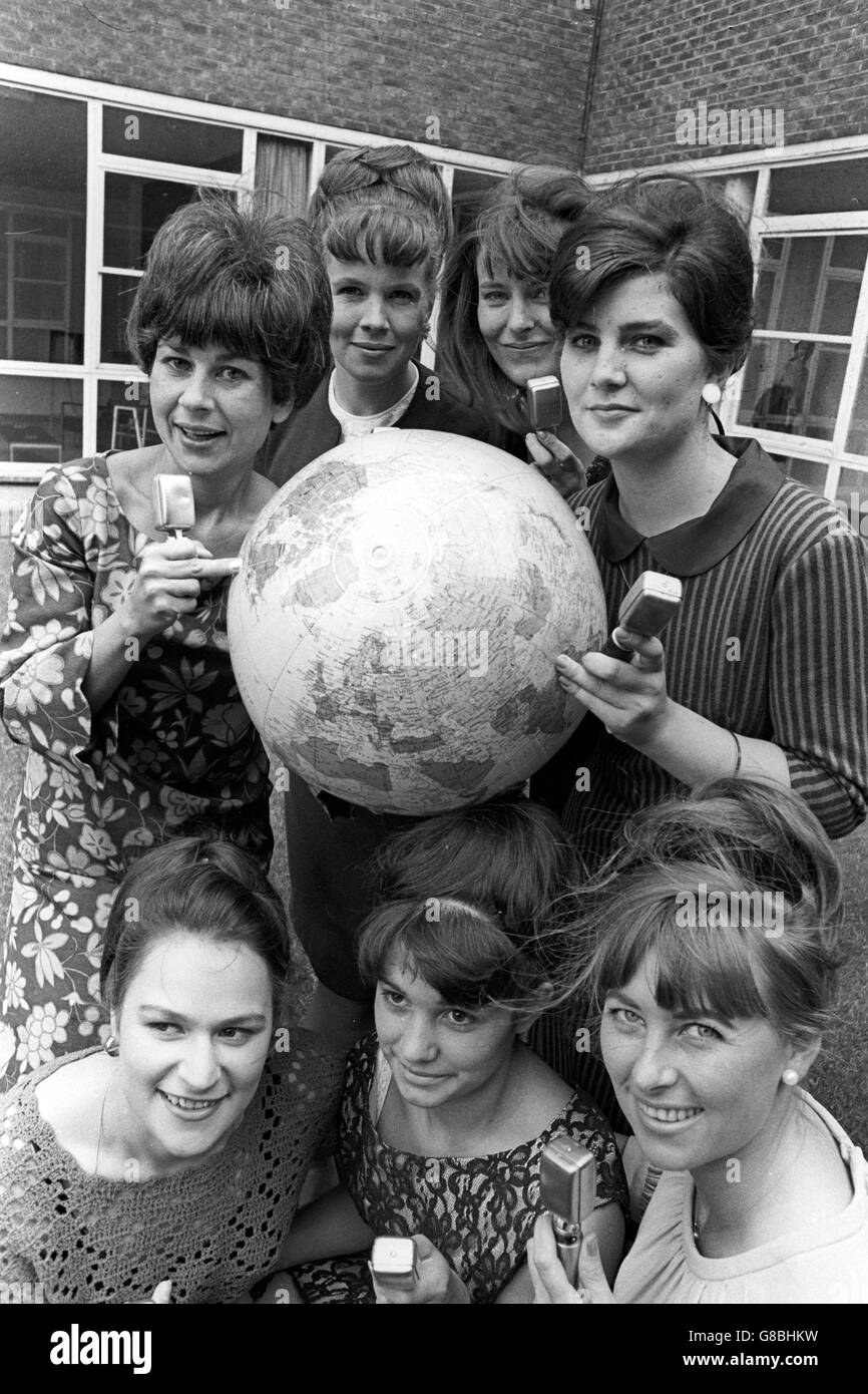 Pictured around a globe in Manchester are the Granada TV girls from across the world who will give special foreign language television reports on World Cup matches played in the North of England. (Back row, l-r) Graziella Morri, Jacqueline De Maximore, Donna Marinova and Angles Cobo. (Front row, l-r) Livia Szabo, Maria-Augusta Ramalho and Erika Pohl. Stock Photo