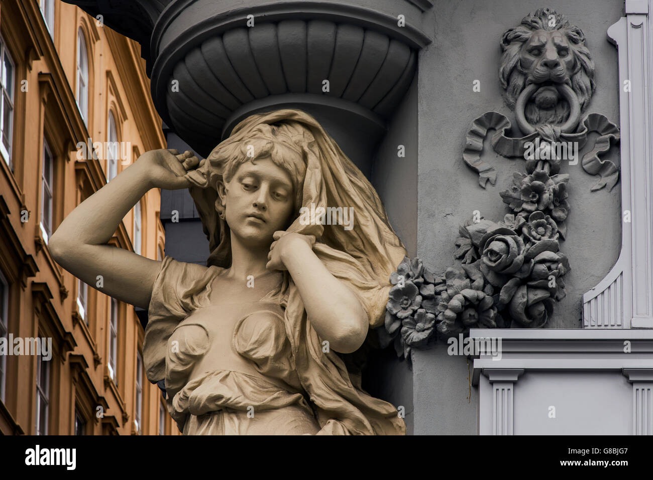 Caryatid sculpted female figure statue on the facade of a building in Graben street, Vienna, Austria Stock Photo