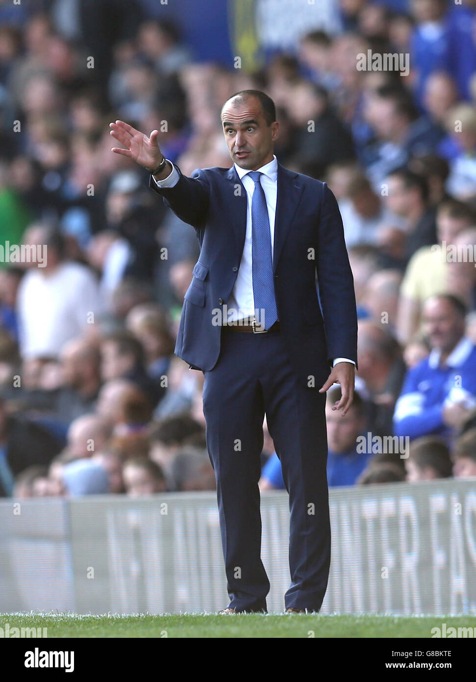 Soccer - Barclays Premier League - Everton v Liverpool - Goodison Park. Everton manager Roberto Martinez gestures on the touchline Stock Photo
