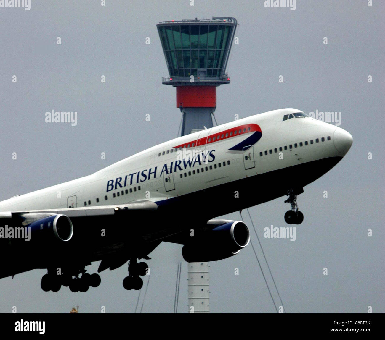 The new control tower at Heathrow airport, London, supported by an 85m-high, 4.6m diameter triangular steel mast anchored to the ground with three pairs of cable stays. At more than twice the height of the original tower, the new structure will provide a vantage point for Heathrow's air traffic controllers to manage operations. The tower, designed by the Richard Rogers Partnership and the engineering company Arup, is located close to the western edge of the exiating central terminal area. Stock Photo