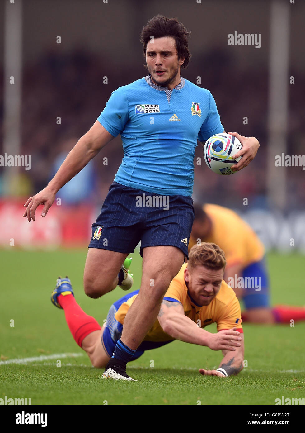 Rugby Union - Rugby World Cup 2015 - Pool D - Italy v Romania - Sandy Park. Italy's Enrico Bacchin gets away from Romania's Csaba Gal during the Rugby World Cup match at Sandy Park, Exeter. Stock Photo