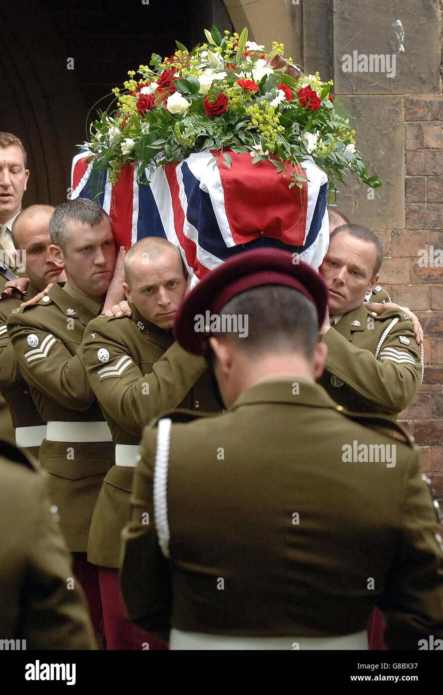 Soldiers from the King's Royal Hussars carry the coffin of Lance Corporal Alan Brackenbury at his Funeral Service at the Holy Trinity Church in East Cowick. The 21-year-old soldier was killed in southern Iraq 'doing the job he loved' when a roadside bomb exploded near the flashpoint town of Al Amarah, in the country's Maysan region, on May 29. Stock Photo