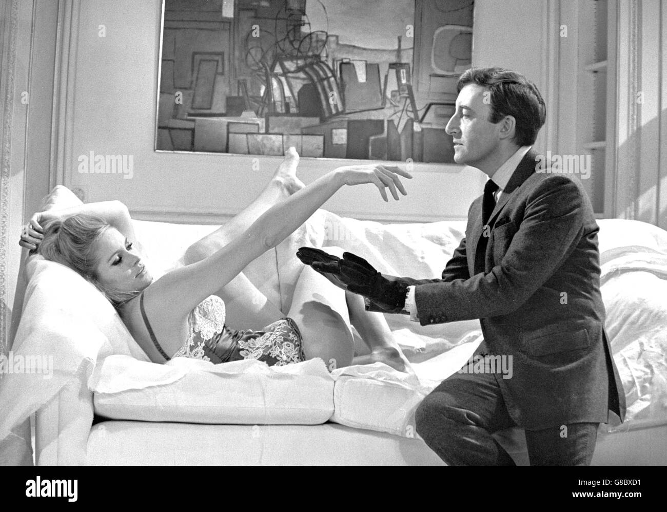Ursula Andress and Peter Sellers in a scene from Charles K Feldman's new Ian Fleming-inspired film Casino Royale. In the film, Sellers plays the part of Evelyn Tremble, a man who has perfected an infallible baccarat system. Stock Photo