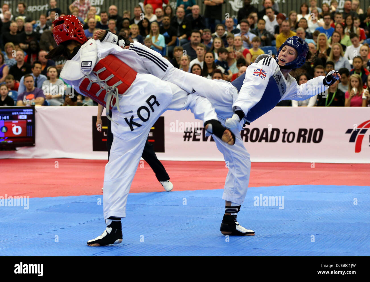 Great Britain's Jade Jones (right) in action against South Korea's Sohee Kim during their Women's -57 Quarter final match during day two of the WTF World Taekwondo Championships at Manchester Regional Arena. Stock Photo