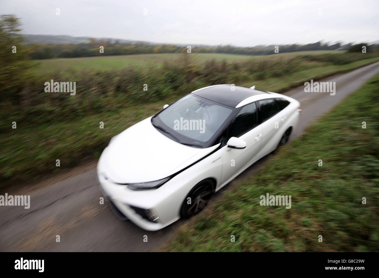 The first mass production dedicated Hydrogen fuel cell vehicle, the Toyota Mirai, goes through it paces in Denham, Buckinghamshire. Stock Photo