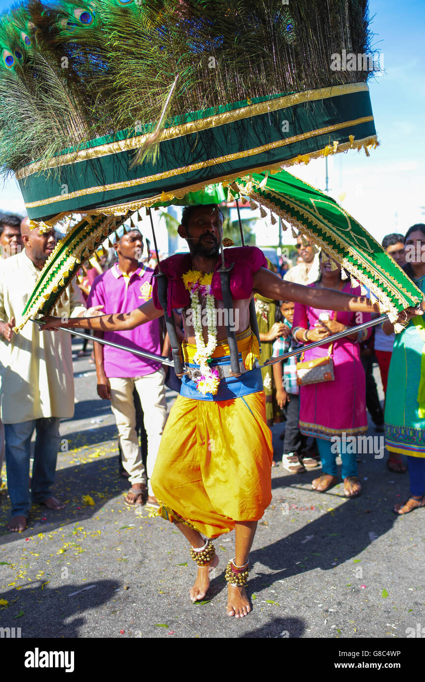 Kavadi bearer dancing at Batu Cave temple entrance, Kuala Lumpur ...