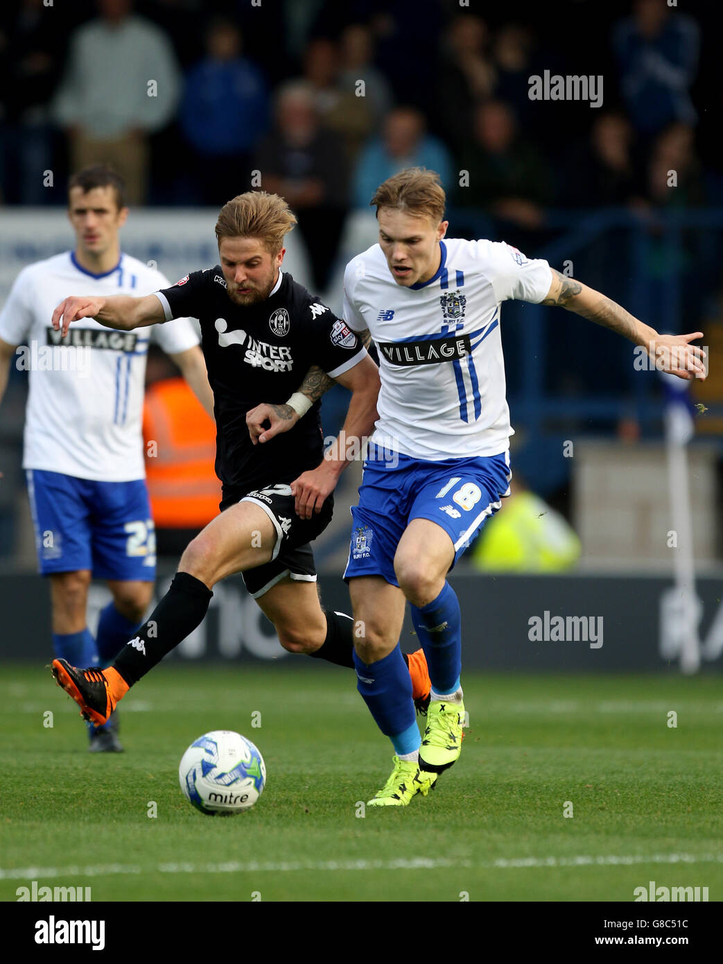 Soccer - Sky Bet League One - Bury v Wigan Athletic - Gigg Lane. Wigan Athletic's Michael Jacobs challenges Bury's Lee Irwin Stock Photo