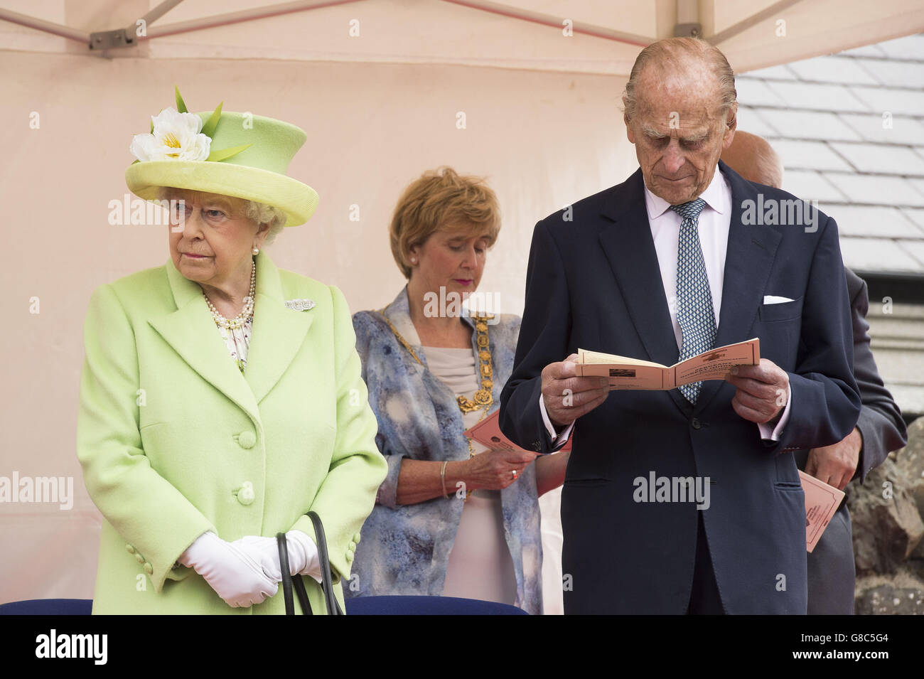 Queen Elizabeth II and the Duke of Edinburgh during a visit to ...