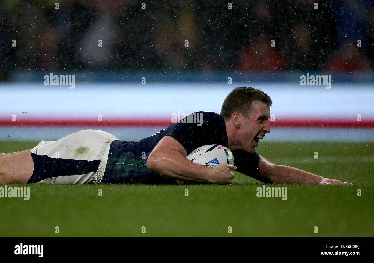 Scotland's Mark Bennett scores his team's third try during the Rugby ...