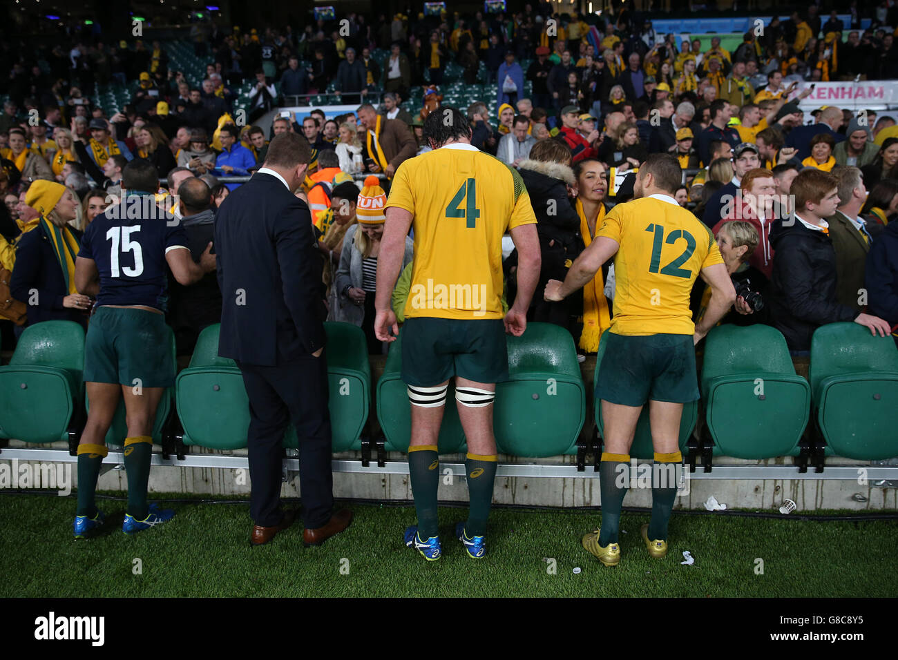 Rugby Union - Rugby World Cup 2015 - Quarter Final - Australia v Scotland - Twickenham Stadium. Australia players celebrate with friends and family after the final whistle of the Rugby World Cup match at Twickenham Stadium, London. Stock Photo