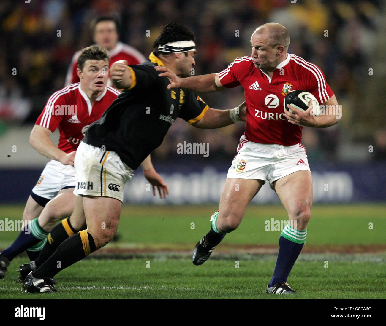 Rugby Union - British & Irish Lions Tour - Wellington v British & Irish Lions - Westpac Stadium. British and Irish Lions' Neil Back (R) hands off the tackle of Wellington's Joe McDonnell. Stock Photo