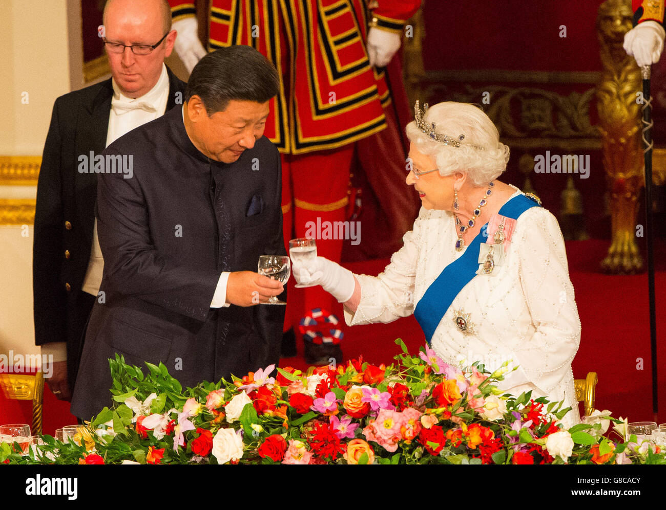 Chinese President Xi Jinping with Queen Elizabeth II at a state banquet at Buckingham Palace, London, during the first day of his state visit to the UK. Stock Photo