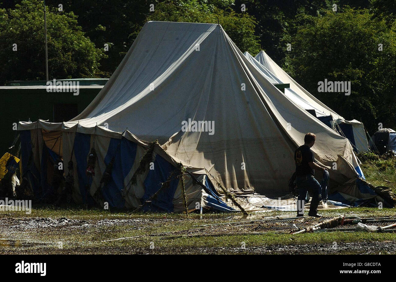 A devastated catering marquee at a campsite at Duncombe Park, after flash floods at the site last night. Damage caused by intense flash floods which cut off parts of Yorkshire will cost tens of millions of pounds to repair, insurers said. Stock Photo