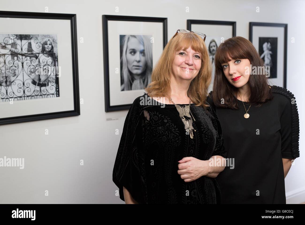 EDITORIAL USE ONLY Curator Sarah Sellers (left), daughter of the of the late actor Peter Sellers and her daughter Emily at his photography exhibition 'Peter Sellers: Behind the Camera', to raise money for the British Heart Foundation in Kensington, London. Stock Photo