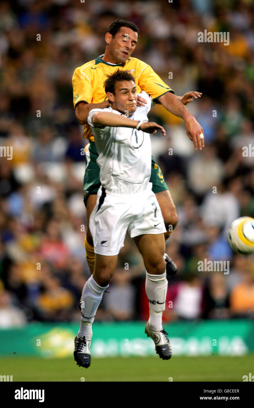 Soccer - International Friendly - Australia v New Zealand - Craven Cottage. Australia's Kevin Muscat and New Zealand's Adrian Webster battle for the ball in the air Stock Photo