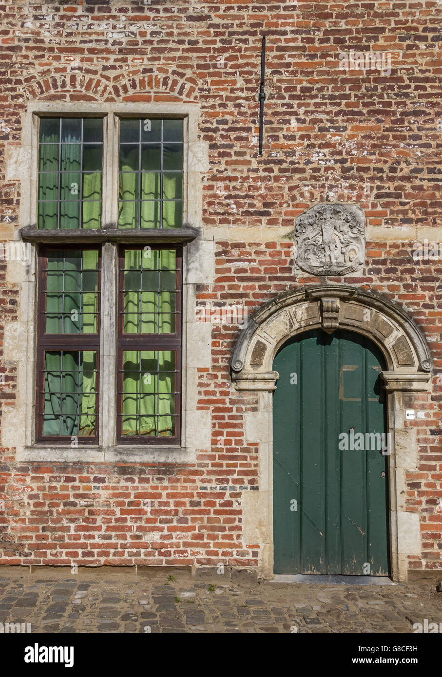 Door and window in the old quarter Begijnhof in Leuven, Belgium Stock Photo
