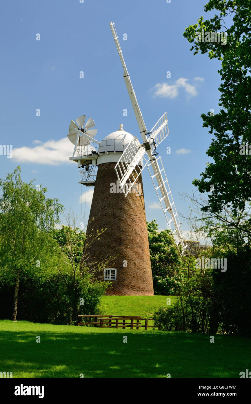 Preserved windmill at a modern business park. Stock Photo