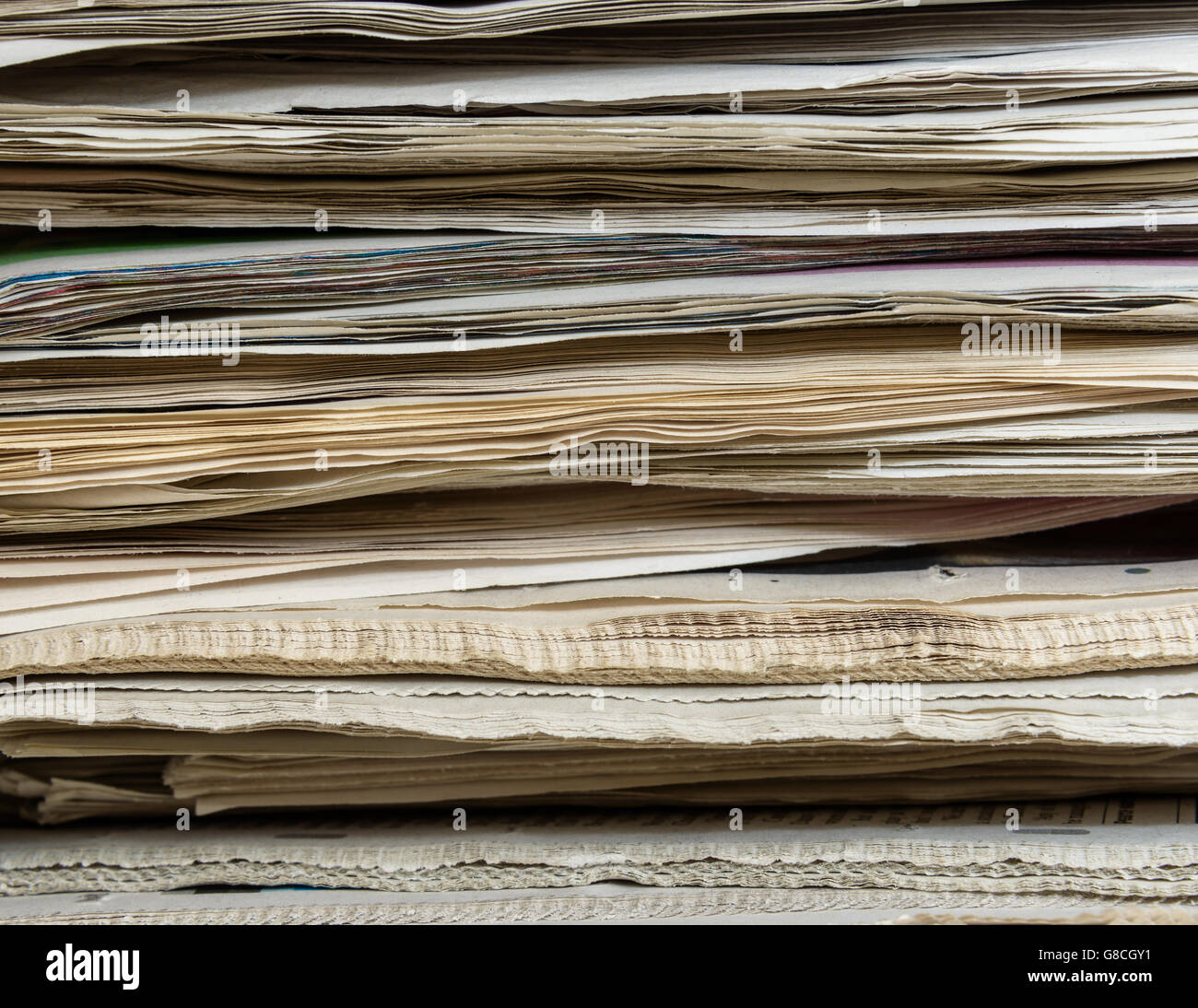 Pile of newspapers closeup Stock Photo