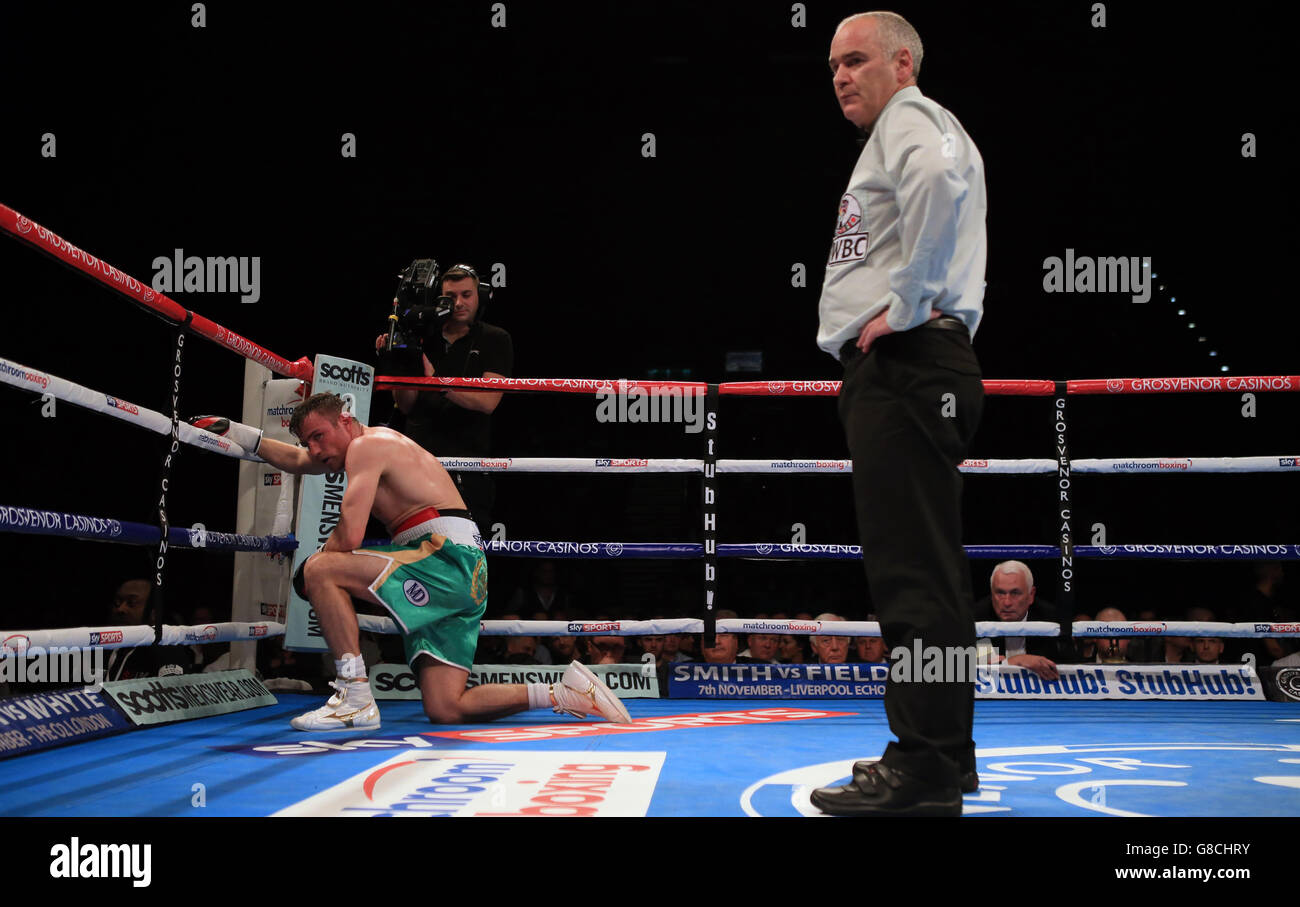 Matthew Macklin rests after being hit by a second low blow from Jason Welborn (not pictured) during their WBC International Super-Welterweight Championship fight at the Barclaycard Arena, Birmingham. Stock Photo