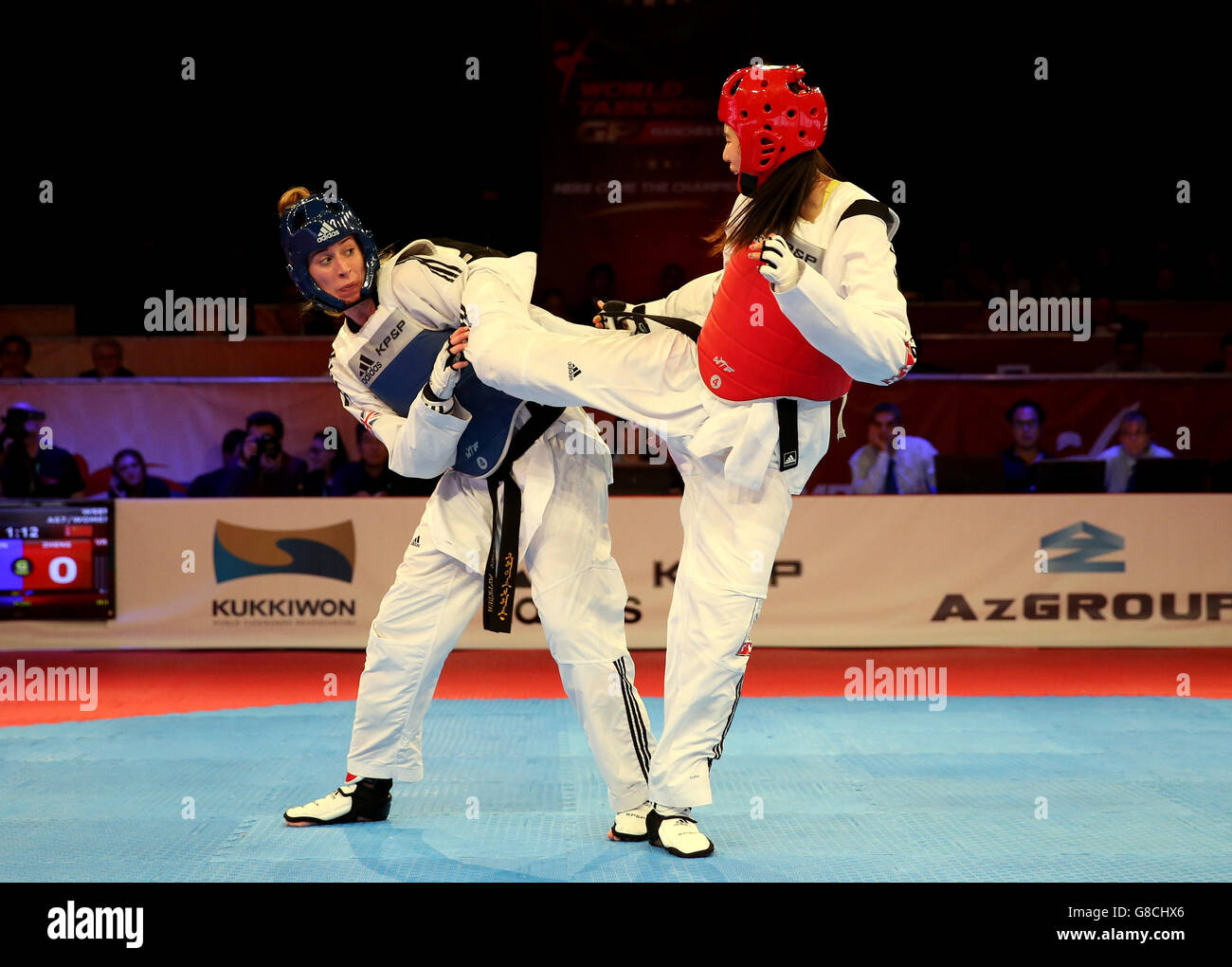 Great Britain's Bianca Walkden (left) in action against China's Shuyin Zheng during the Women's +67 final match during day two of the WTF World Taekwondo Championships at Manchester Regional Arena. Stock Photo