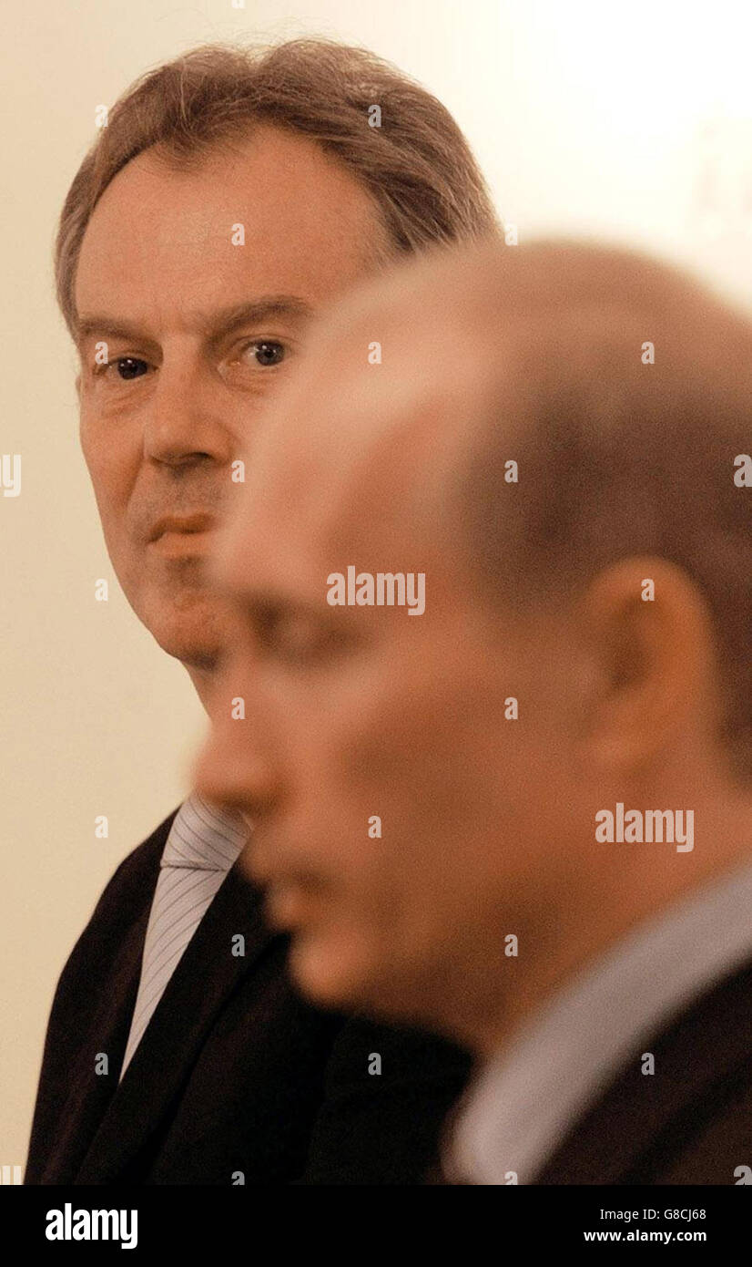 Britain's Prime Minister Tony Blair (left) and Russian President Vladimir Putin hold a press conference at his private dacha outside Moscow. Mr Blair conceded today that he was taking over the presidency of the EU at 'an interesting time' for Europe as he joined Mr Putin at the start of a hectic diplomatic week that ends with a crunch EU summit in Brussels. Stock Photo
