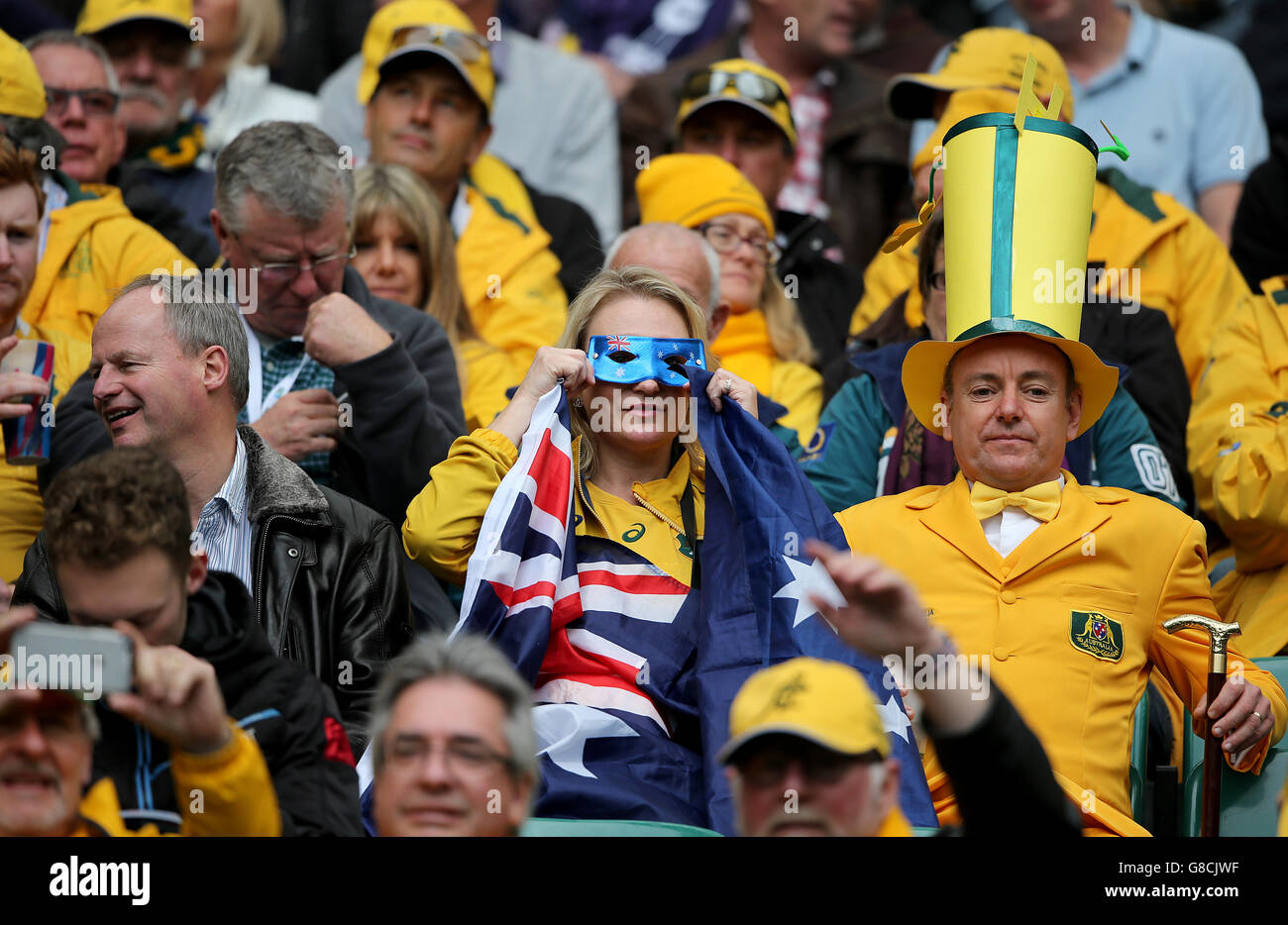 Australia fans show support for their team in the stands during the